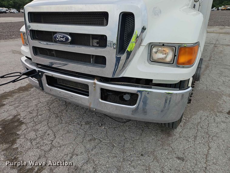 image for item YA3299 2015 Ford F750 Super Duty chipper truck