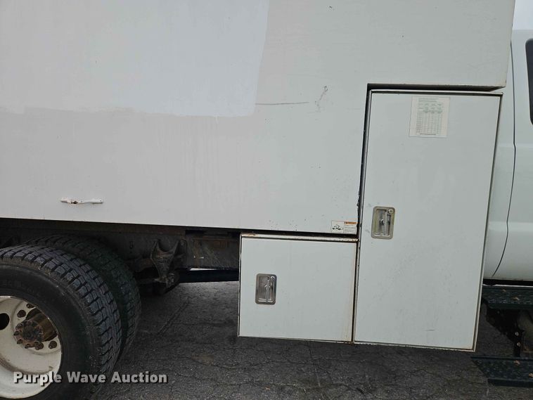 image for item YA3299 2015 Ford F750 Super Duty chipper truck
