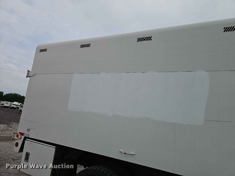 image for item YA3299 2015 Ford F750 Super Duty chipper truck