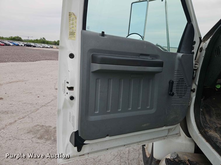image for item YA3299 2015 Ford F750 Super Duty chipper truck