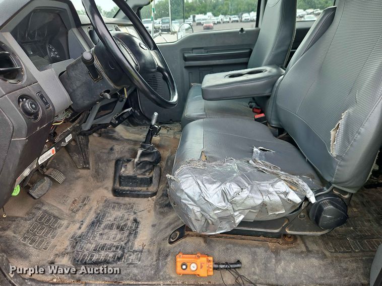 image for item YA3299 2015 Ford F750 Super Duty chipper truck