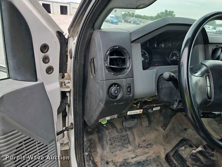 image for item YA3299 2015 Ford F750 Super Duty chipper truck