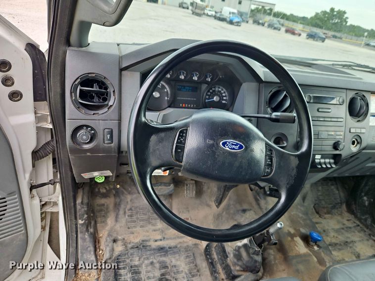 image for item YA3299 2015 Ford F750 Super Duty chipper truck