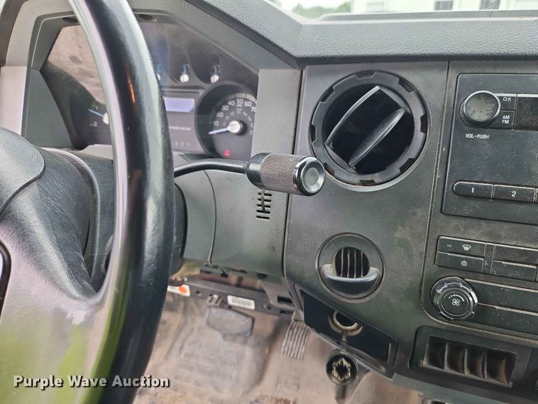 image for item YA3299 2015 Ford F750 Super Duty chipper truck