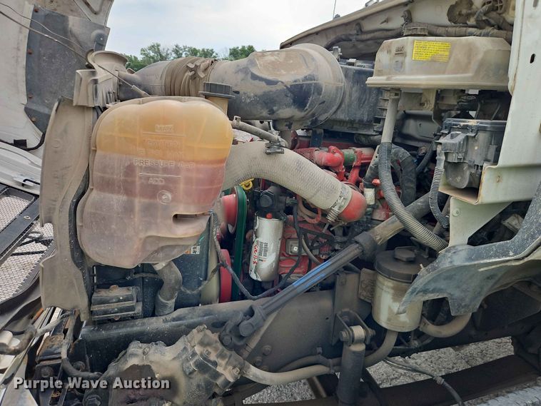 image for item YA3299 2015 Ford F750 Super Duty chipper truck