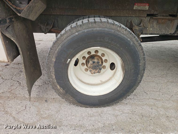 image for item YA3299 2015 Ford F750 Super Duty chipper truck