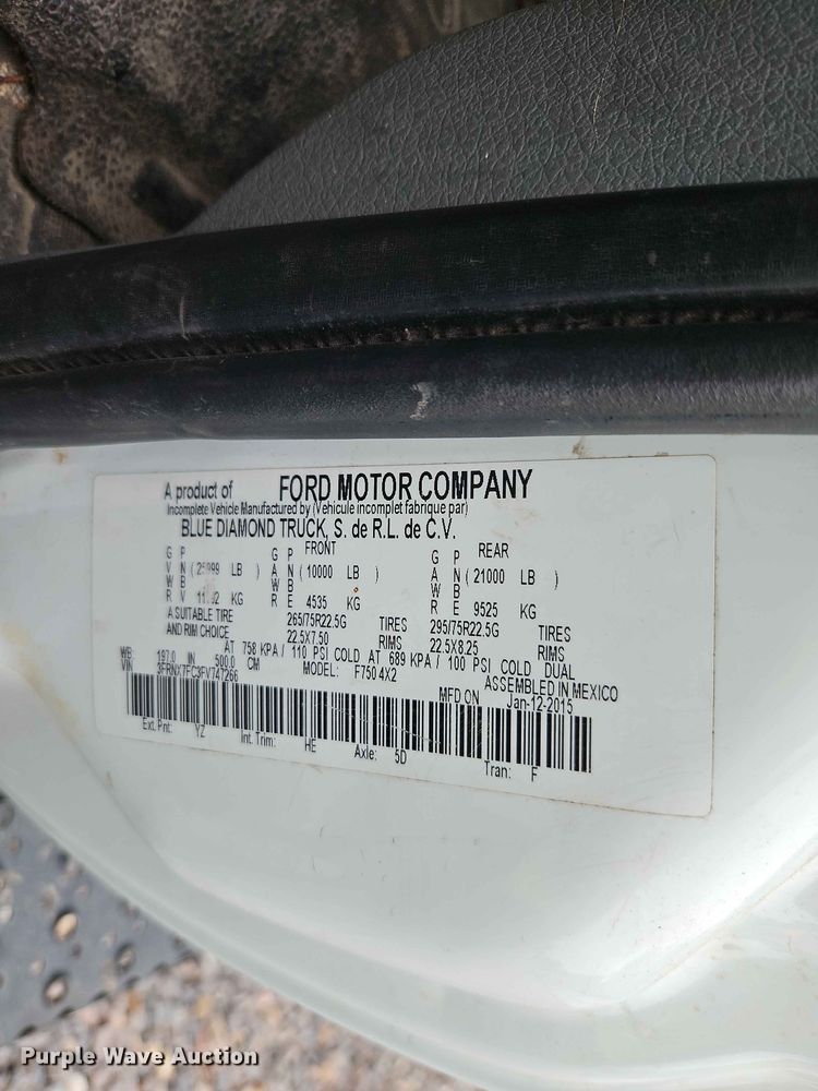 image for item YA3299 2015 Ford F750 Super Duty chipper truck