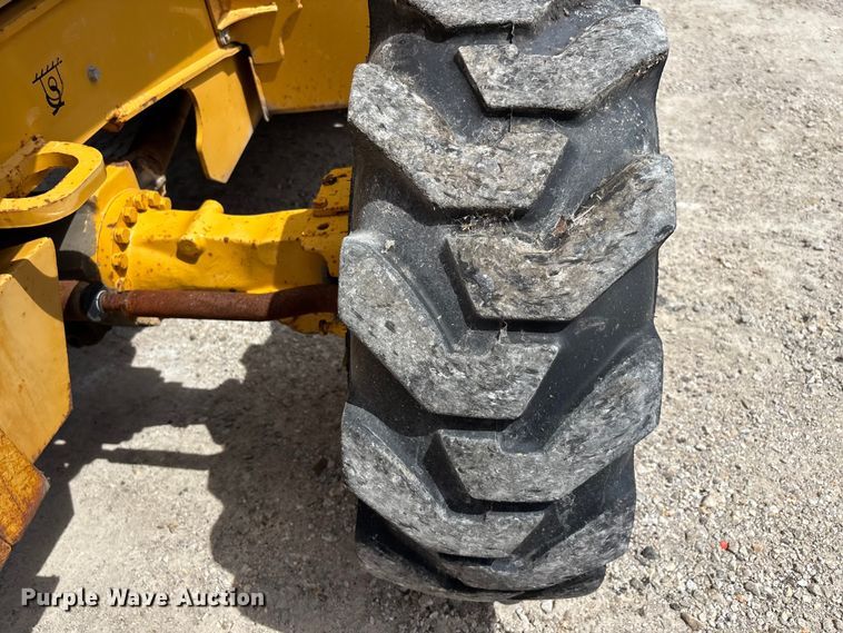 image for item DQ5478 John Deere 310SG backhoe