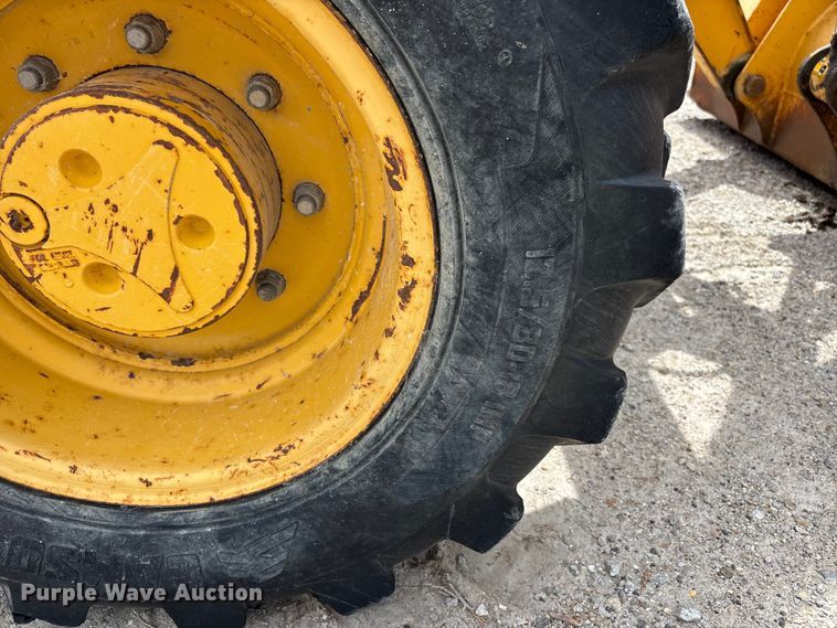 image for item DQ5478 John Deere 310SG backhoe