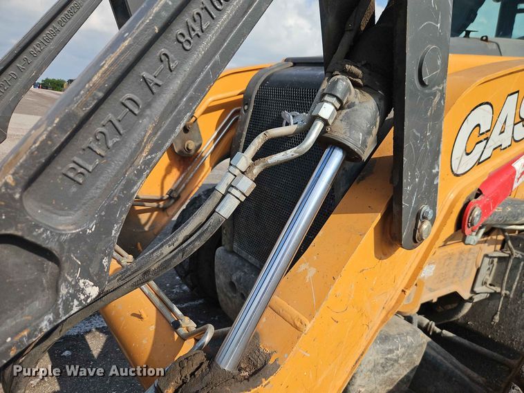 image for item EO7463 2021 Case 580SN backhoe