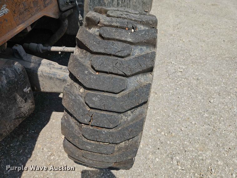 image for item EO7464 2021 Case 580SN backhoe