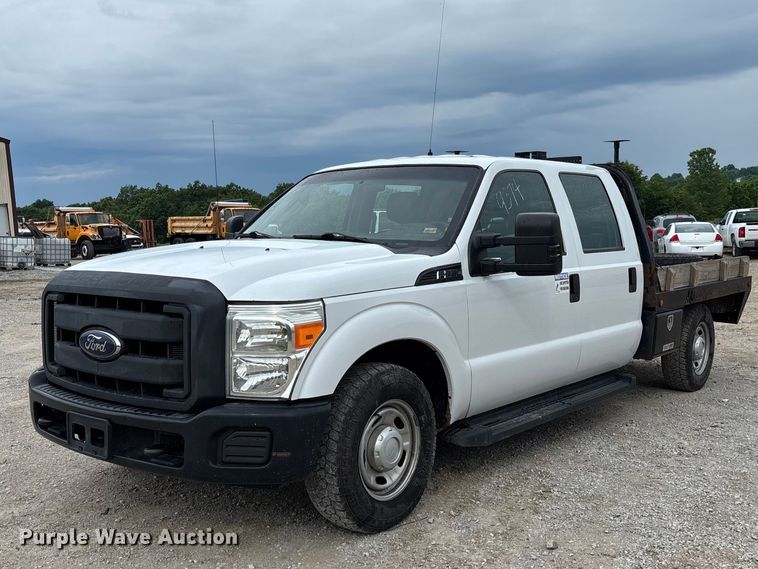 2016 Ford F250 Super Duty Crew Cab flatbed pickup truck