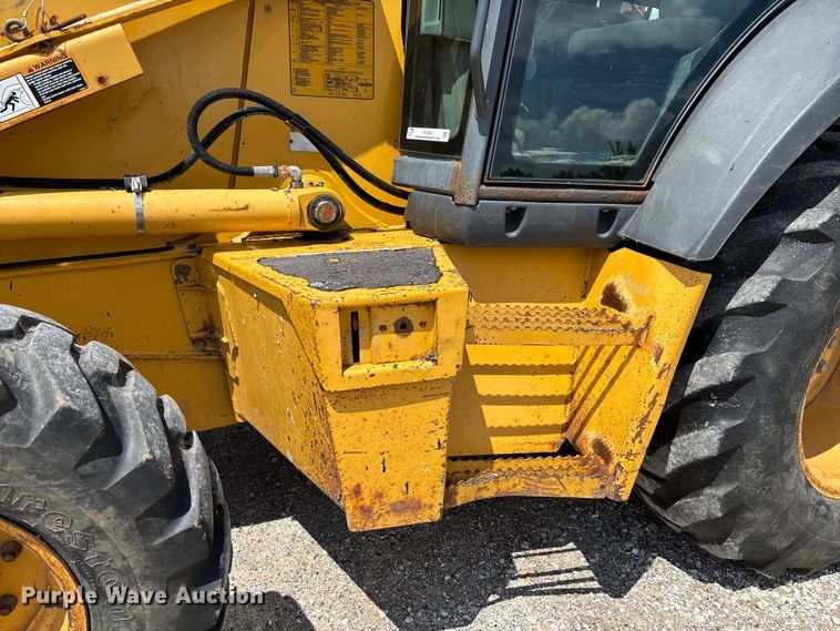 image for item FC5857 2003 John Deere 310SG backhoe