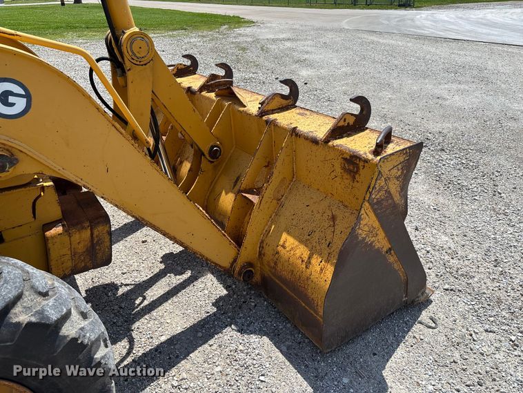 image for item FC5857 2003 John Deere 310SG backhoe