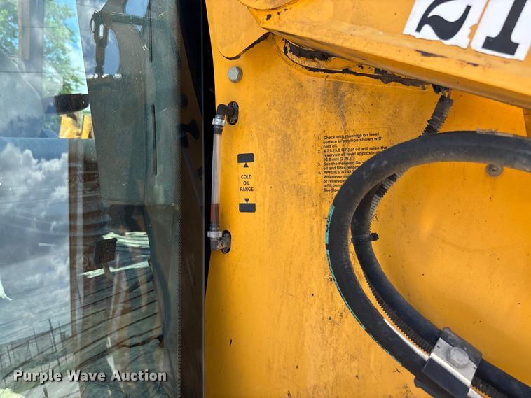 image for item FC5857 2003 John Deere 310SG backhoe
