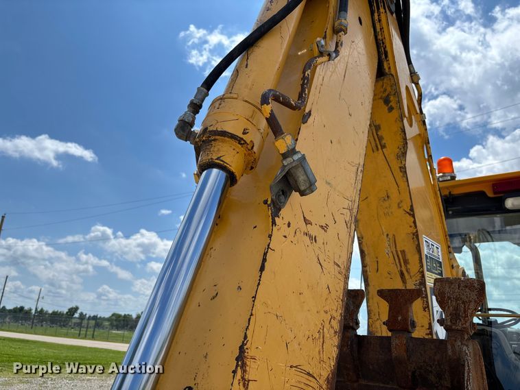 image for item FC5857 2003 John Deere 310SG backhoe