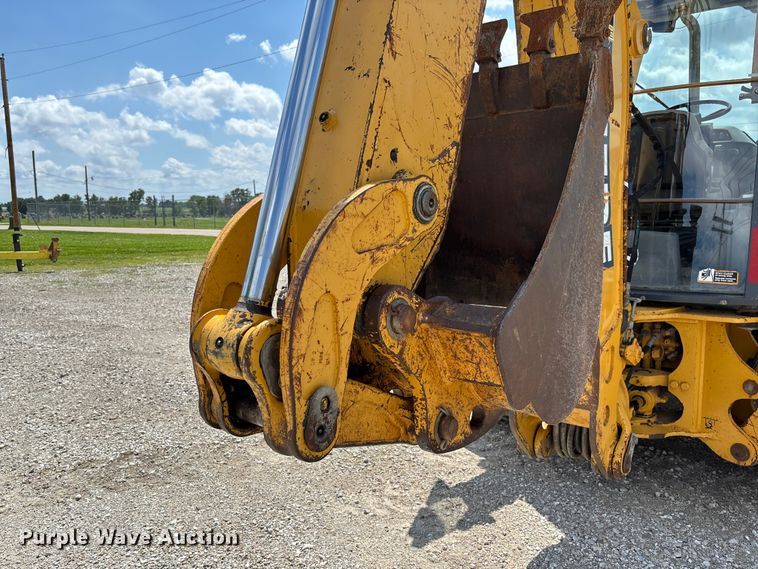 image for item FC5857 2003 John Deere 310SG backhoe