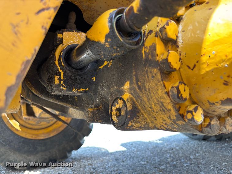 image for item FC5857 2003 John Deere 310SG backhoe