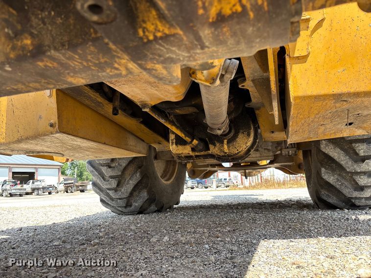 image for item FC5857 2003 John Deere 310SG backhoe