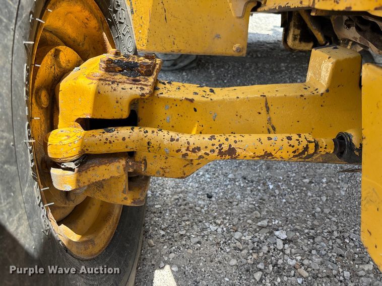 image for item FC5857 2003 John Deere 310SG backhoe