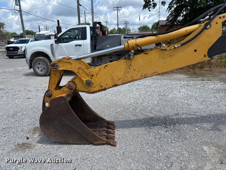 image for item FC5857 2003 John Deere 310SG backhoe