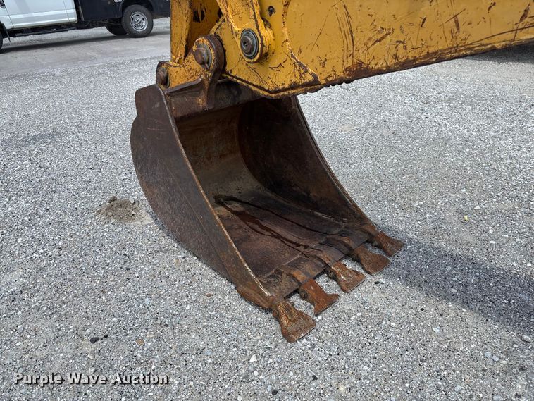 image for item FC5857 2003 John Deere 310SG backhoe