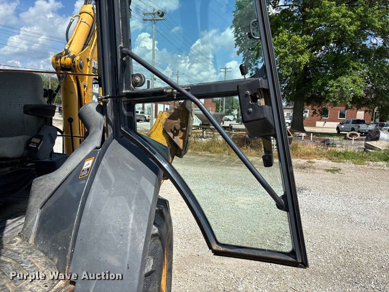 image for item FC5857 2003 John Deere 310SG backhoe