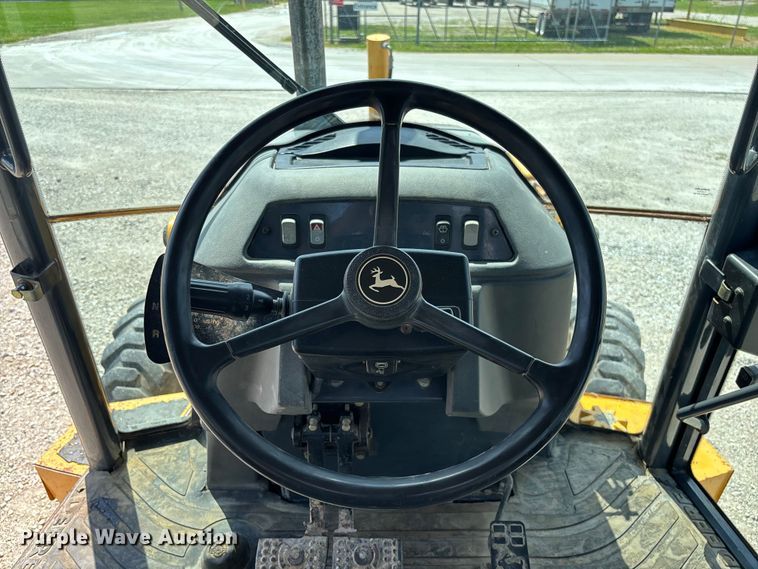 image for item FC5857 2003 John Deere 310SG backhoe