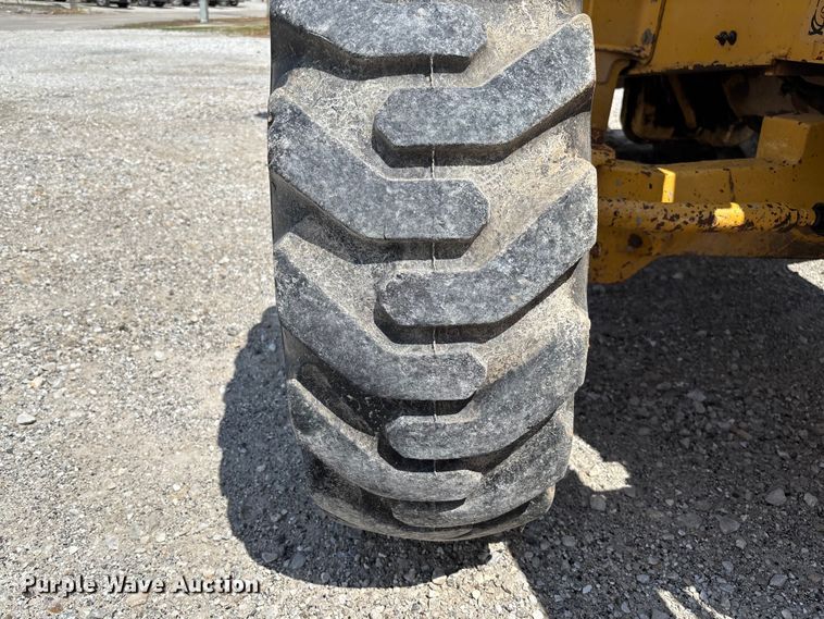 image for item FC5857 2003 John Deere 310SG backhoe
