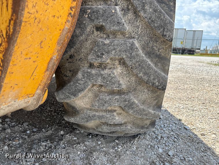 image for item FC5857 2003 John Deere 310SG backhoe