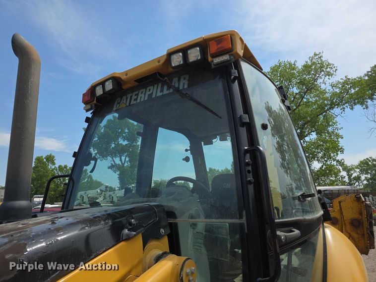 image for item FI0954 2011 Caterpillar 450E backhoe