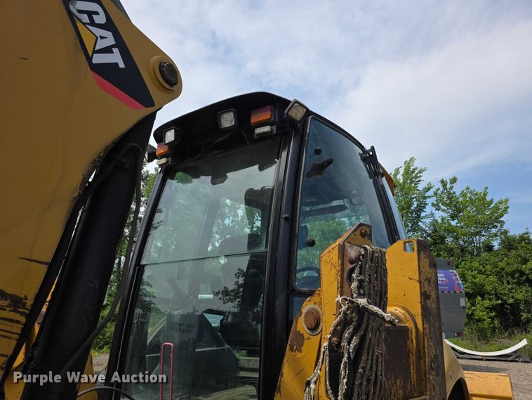 image for item FI0954 2011 Caterpillar 450E backhoe