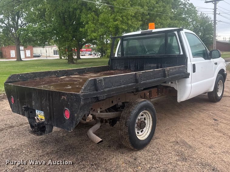 image for item MX9180 1999 Ford F250 Super Duty flatbed pickup truck