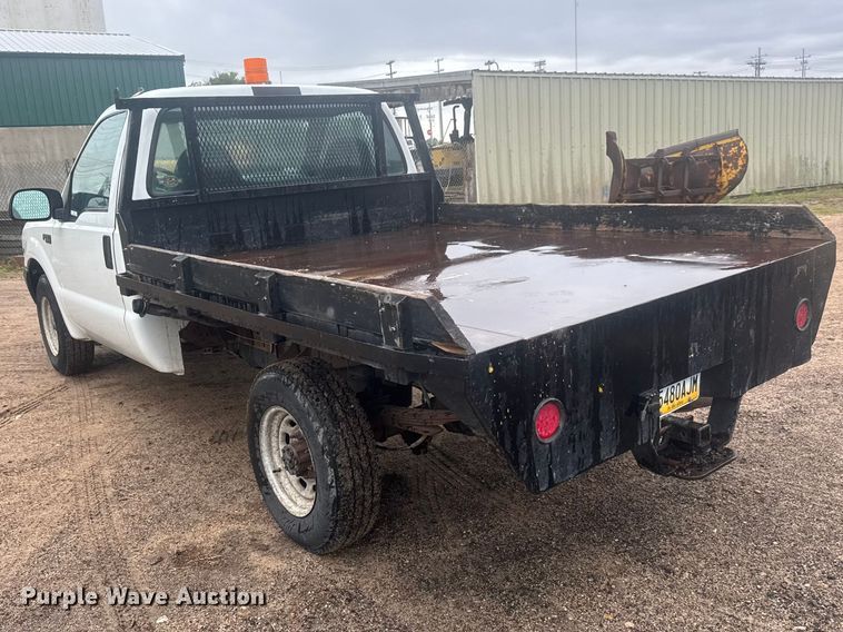 image for item MX9180 1999 Ford F250 Super Duty flatbed pickup truck