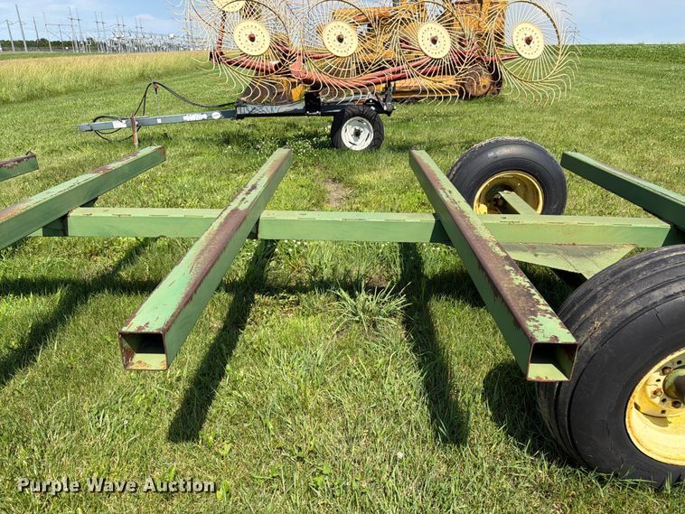 image for item EN0321 John Deere hay bale trailer