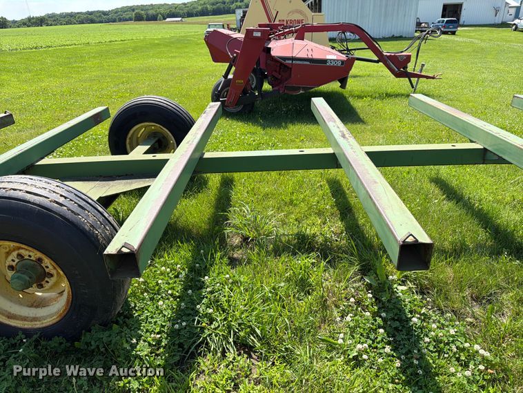 image for item EN0321 John Deere hay bale trailer