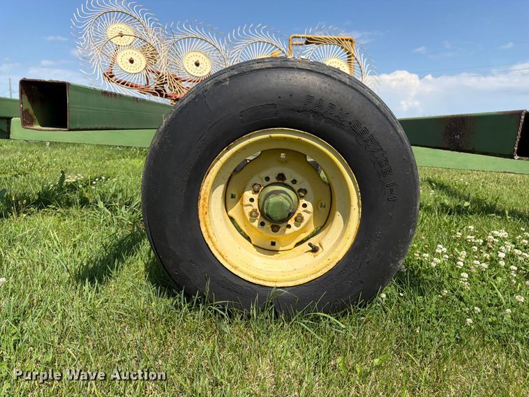 image for item EN0321 John Deere hay bale trailer