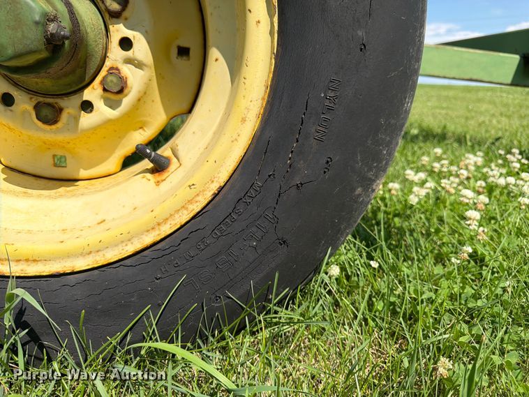 image for item EN0321 John Deere hay bale trailer