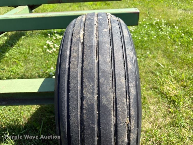 image for item EN0321 John Deere hay bale trailer