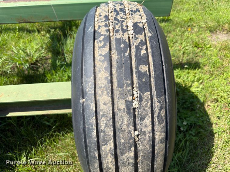image for item EN0321 John Deere hay bale trailer