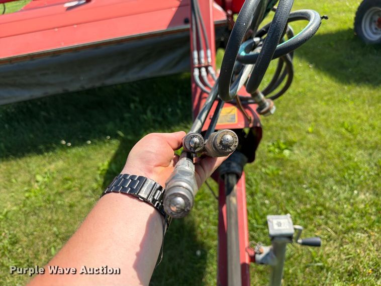 image for item EN0322 J.I. Case 3309 swather / windrower