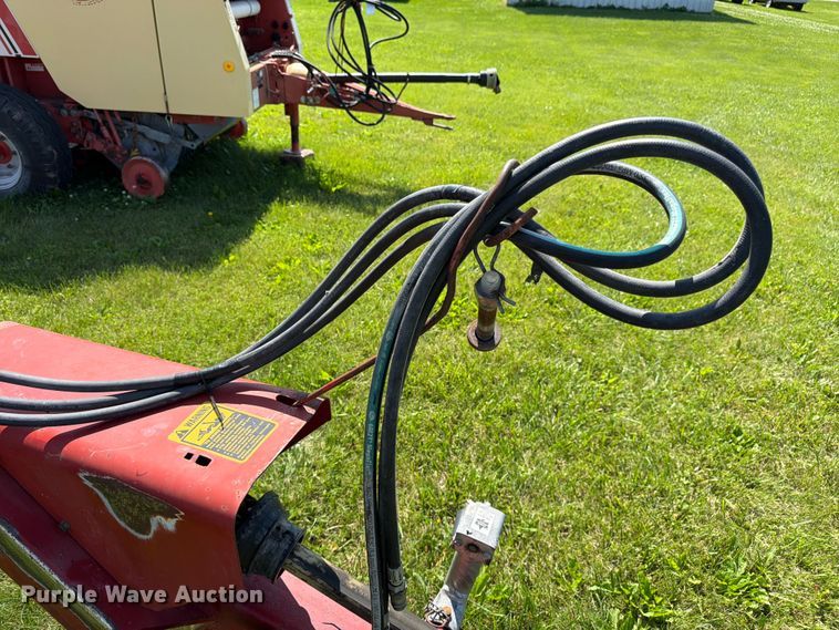 image for item EN0322 J.I. Case 3309 swather / windrower