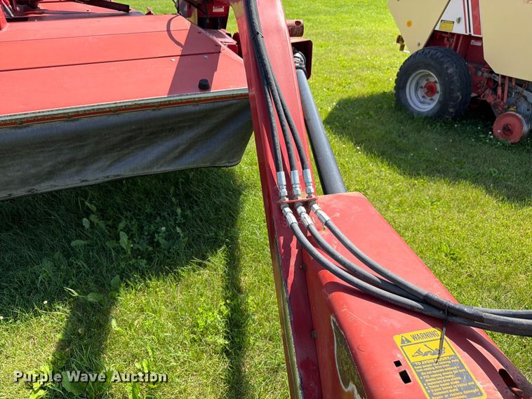 image for item EN0322 J.I. Case 3309 swather / windrower