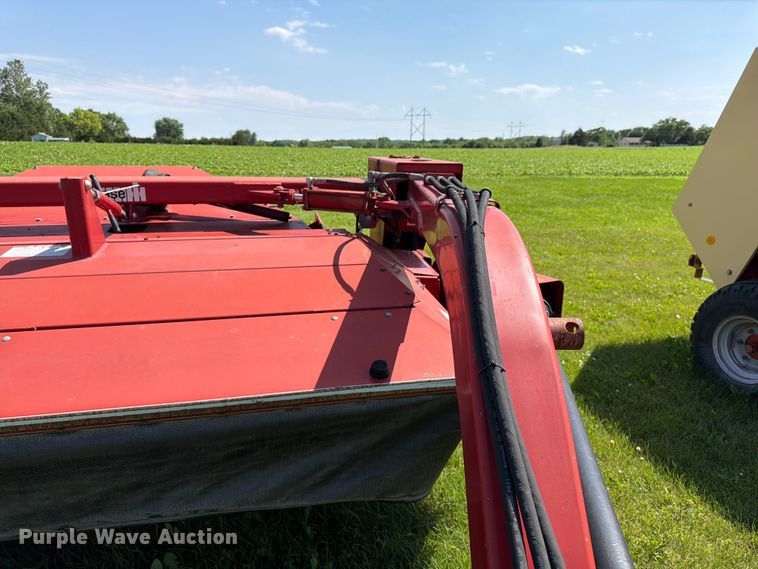 image for item EN0322 J.I. Case 3309 swather / windrower