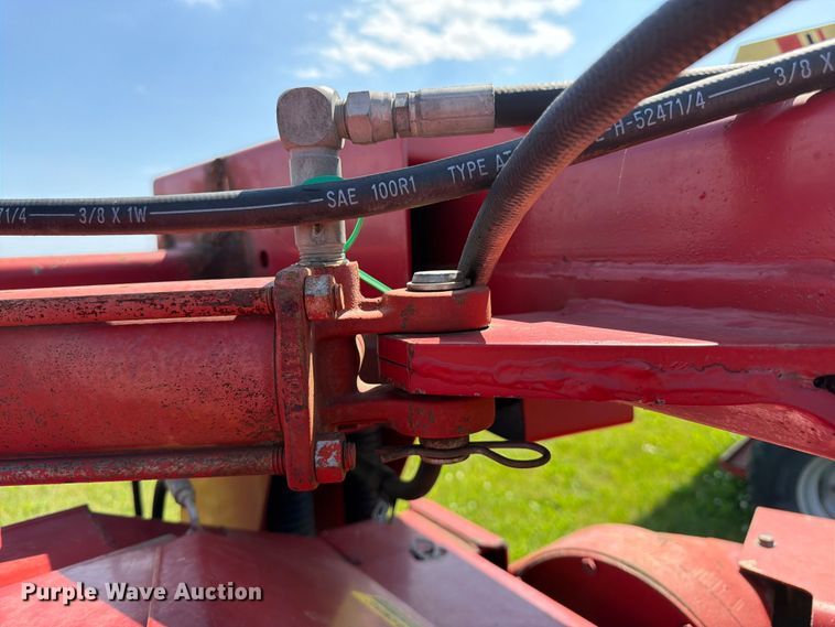 image for item EN0322 J.I. Case 3309 swather / windrower