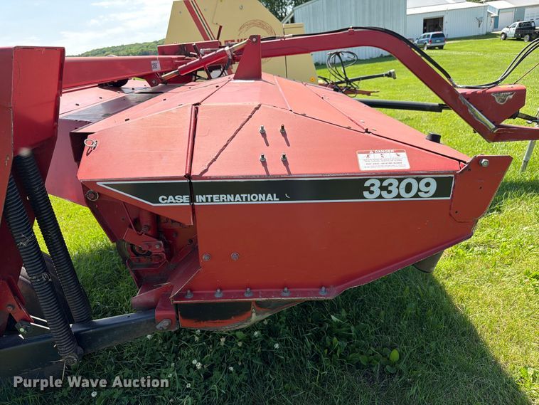 image for item EN0322 J.I. Case 3309 swather / windrower