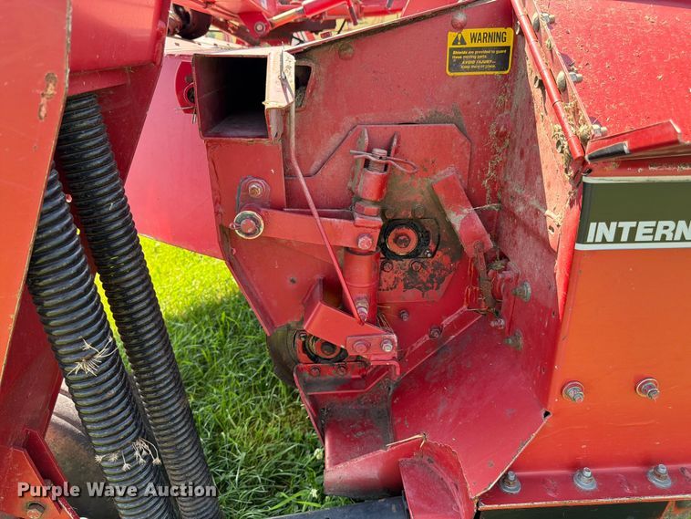 image for item EN0322 J.I. Case 3309 swather / windrower