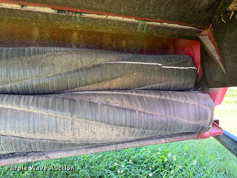 image for item EN0322 J.I. Case 3309 swather / windrower