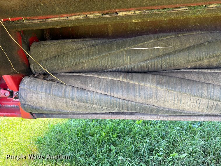 image for item EN0322 J.I. Case 3309 swather / windrower