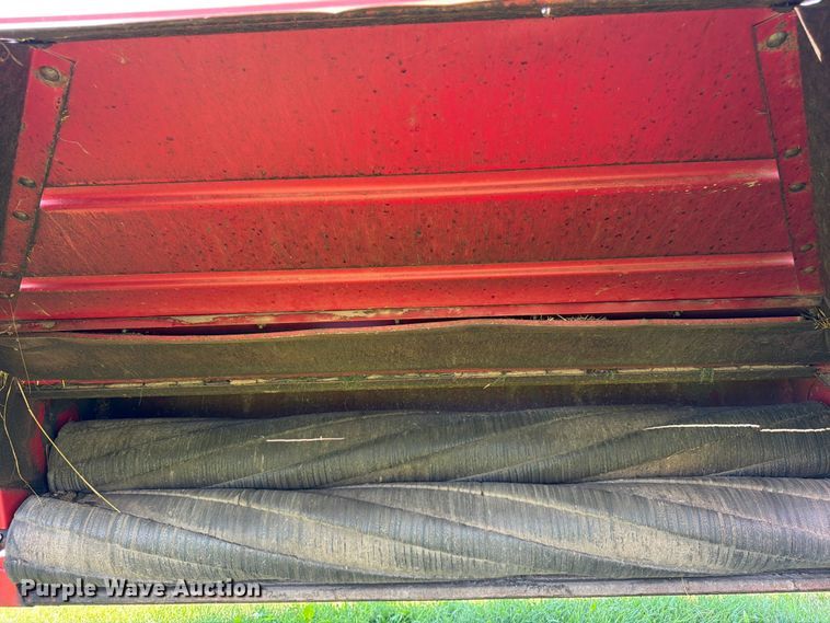 image for item EN0322 J.I. Case 3309 swather / windrower